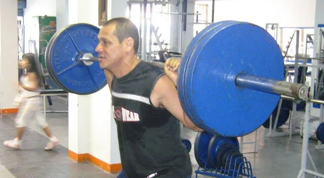 Sentadilla con peso Sentadilla con peso